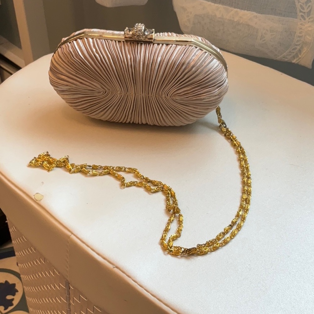 Elegant Cream Clutch with Gold Chain
